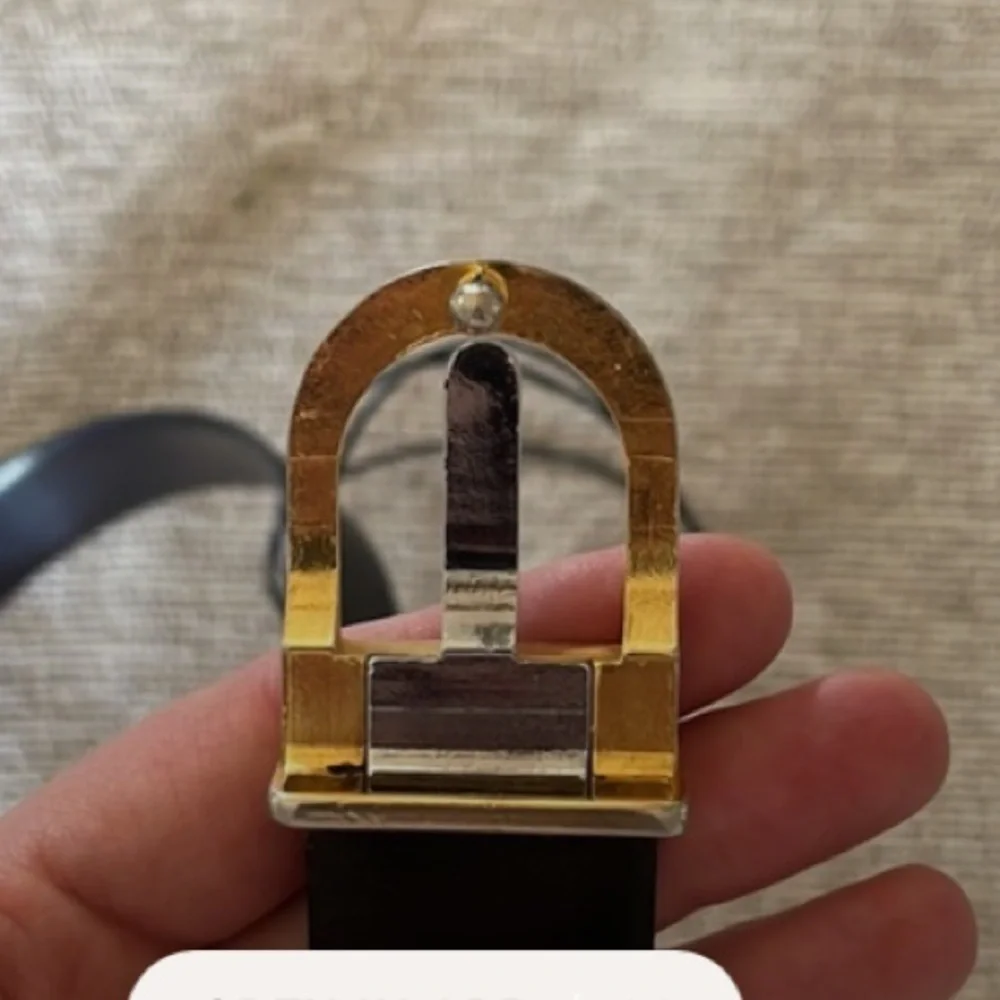 Vintage Yves Saint Laurent with gold/diver buckle